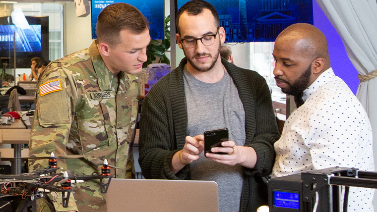 woman with glasses working